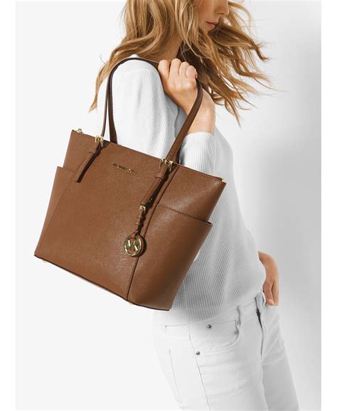 michael michael kors east west top zip tote|Michael Kors Tote with zipper.